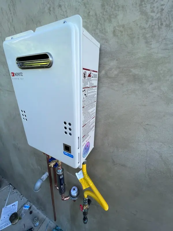 Tankless water heater installation for West District homes